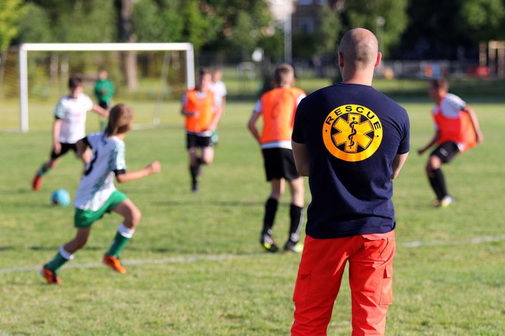 Teenager playing soccer