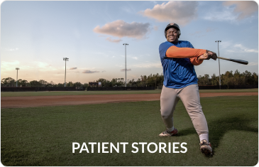 Teen playing baseball